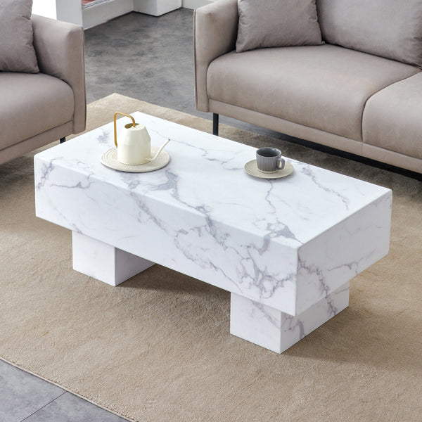 The white coffee table has patterns. Modern rectangular table, suitable for living rooms and apartments. 43.3"*21.6"*17.2"